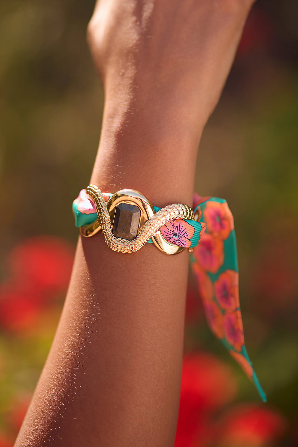 Beautifully sculpted cuff bracelets with silky ribbons. Handcrafted jewelry that looks like art..